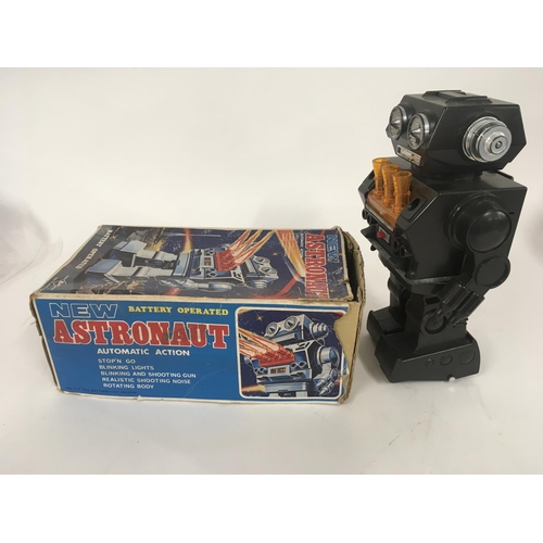 98 - A boxed battery operated robot called ASTRONAUT it has several features. Made in Japan. Box is worn ... 