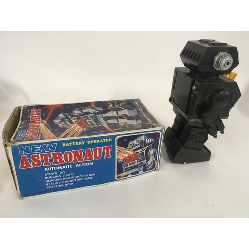 98 - A boxed battery operated robot called ASTRONAUT it has several features. Made in Japan. Box is worn ... 