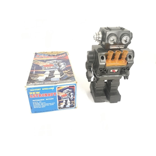 98 - A boxed battery operated robot called ASTRONAUT it has several features. Made in Japan. Box is worn ... 