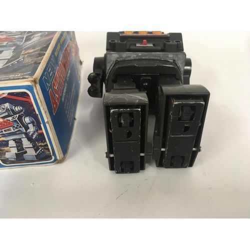 98 - A boxed battery operated robot called ASTRONAUT it has several features. Made in Japan. Box is worn ... 