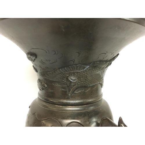 1012 - A large Japanese 19th century bronze vase with raised figures of birds, approximately 40cm tall. Pos... 