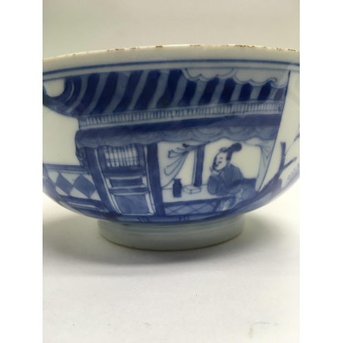 1015 - A Chinese blue and white bowl decorated with figures with garden view .15 cm width height 6.5 cm .