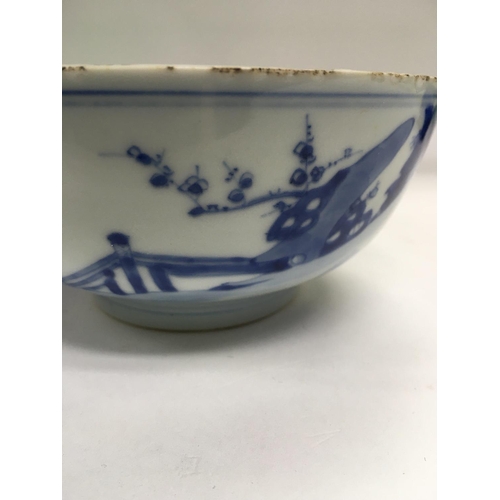 1015 - A Chinese blue and white bowl decorated with figures with garden view .15 cm width height 6.5 cm .