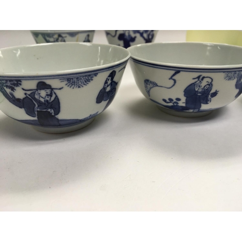 1016 - Five Chinese blue and white decorated with figures in landscape Three with no visible damage or rest... 