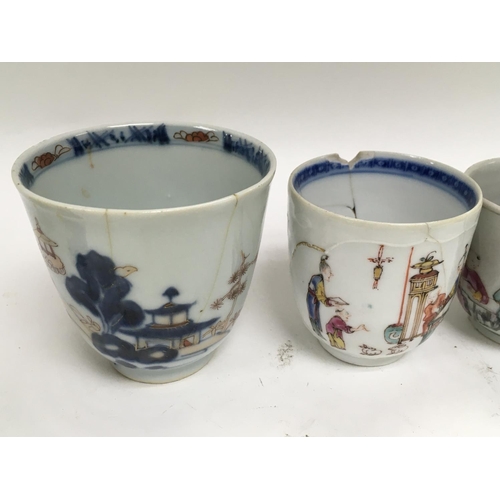 1017 - A collection of Chinese ceramics including a small blue and white vase13 cm four cups and a dish .