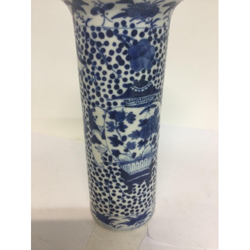 1023 - A Chinese blue and white vase decorated with birds figures and foliage.four marks to base 20cm .