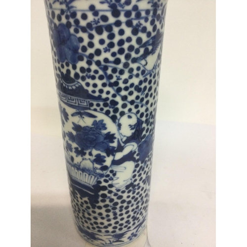 1023 - A Chinese blue and white vase decorated with birds figures and foliage.four marks to base 20cm .