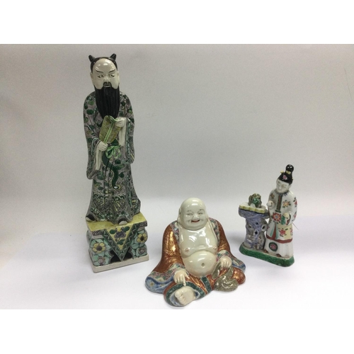 1028 - Three Oriental ceramic figures comprising a buddha, a geisha and a scholar. Shipping category D.