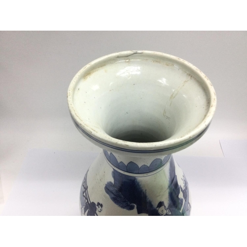 1033 - A blue and white vase decorated with figures in a garden setting, approx 35cm. Shipping category D.