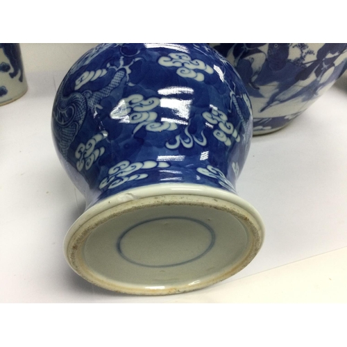 1044 - Five blue and white vases, various sizes and firms, tallest approx 29cm. Some damages. Shipping cate... 