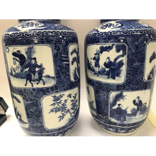 1047 - A pair of Chinese blue and white vases decorated with various panels depicting figures, birds flower... 