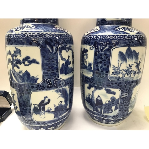 1047 - A pair of Chinese blue and white vases decorated with various panels depicting figures, birds flower... 