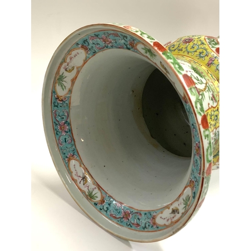 1049 - A 19thC Cantonese porcelain yellow ground double ended vase, H.38.5cm x D.25.5cm