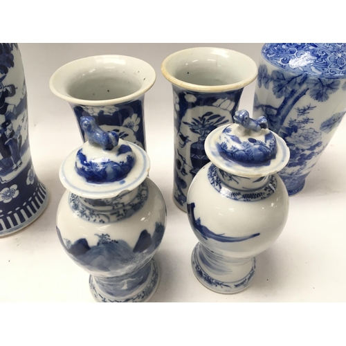 1053 - A collection of Chinese blue and white ceramics. 2 pairs of vases decorated with landscape views and... 