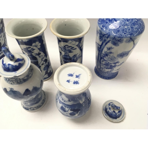 1053 - A collection of Chinese blue and white ceramics. 2 pairs of vases decorated with landscape views and... 