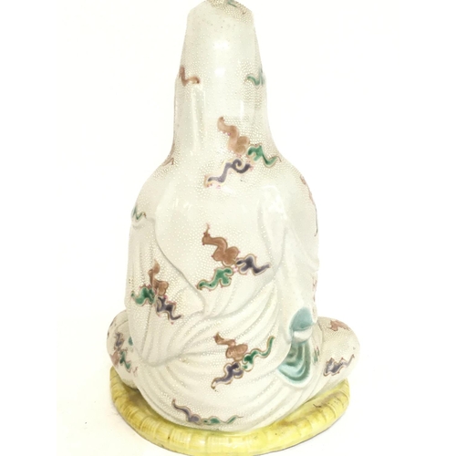 1058 - A late 19th century Japanese Kutani satsuma porcelain figure. 26.5cm tall. Postage category D