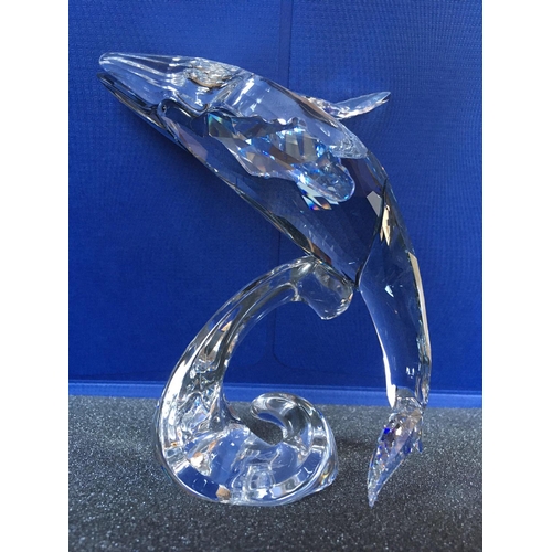 1109 - A large Swarovski Paikea Whale figure breaching against a wave in fitted box with certificate of aut... 