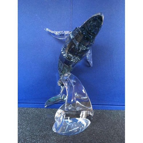 1109 - A large Swarovski Paikea Whale figure breaching against a wave in fitted box with certificate of aut... 