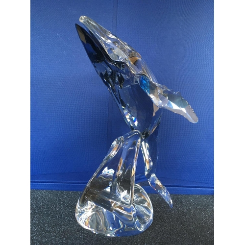 1109 - A large Swarovski Paikea Whale figure breaching against a wave in fitted box with certificate of aut... 