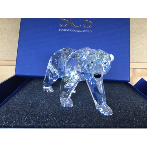 1111 - A Large Swarovski Siku Polar Bear figure in fitted box with certificate of authenticity.