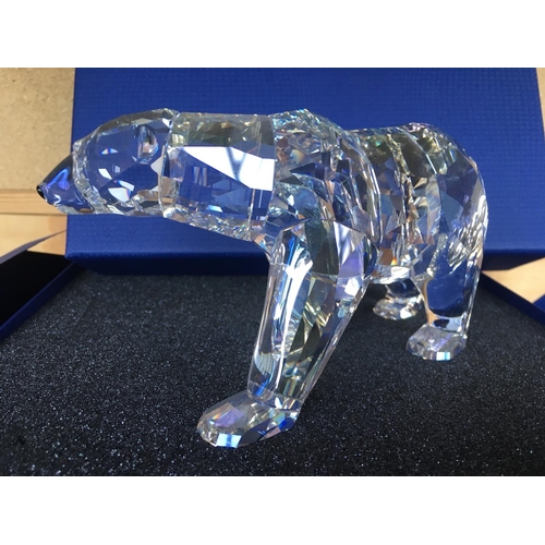 1111 - A Large Swarovski Siku Polar Bear figure in fitted box with certificate of authenticity.