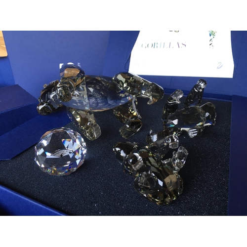 1119 - Three Swarovski Gorilla figures from the Engangered wildlife series in fitted boxes with certificate... 