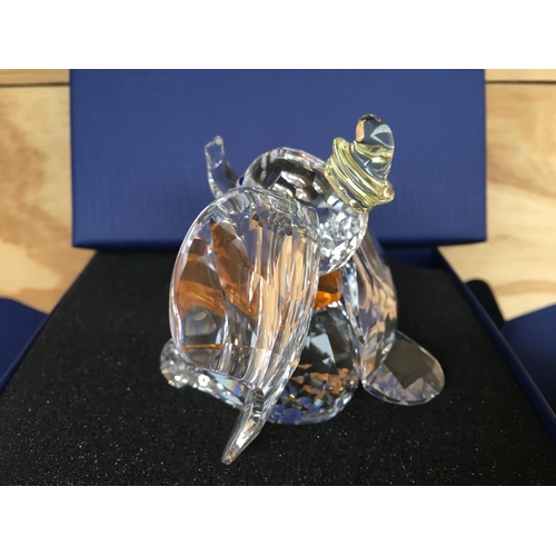 1136 - A boxed Swarovski figure of Disneyâs Dumbo the elephant 2011, with yellow hat and orange necktie. ... 