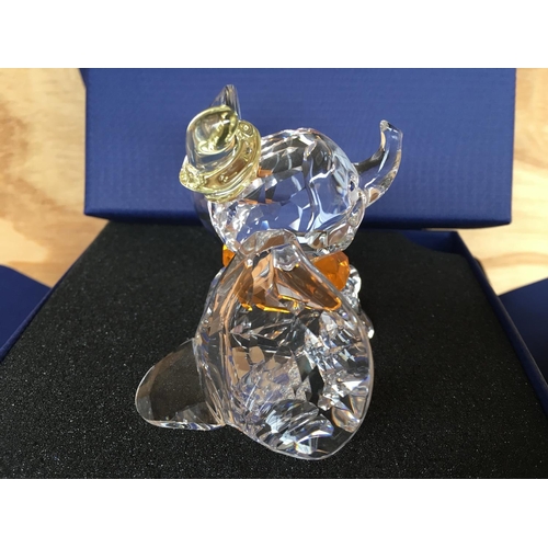 1136 - A boxed Swarovski figure of Disneyâs Dumbo the elephant 2011, with yellow hat and orange necktie. ... 