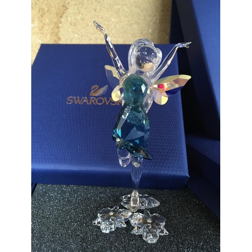 1139 - Four boxed Disney Tinkerbell fairy figures in different colours including Christmas outfit, includin... 