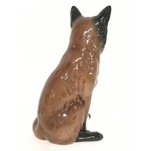 1225 - A Beswick Porcelain fox figure, 31cm tall. No obvious damage or restoration. Postage category D