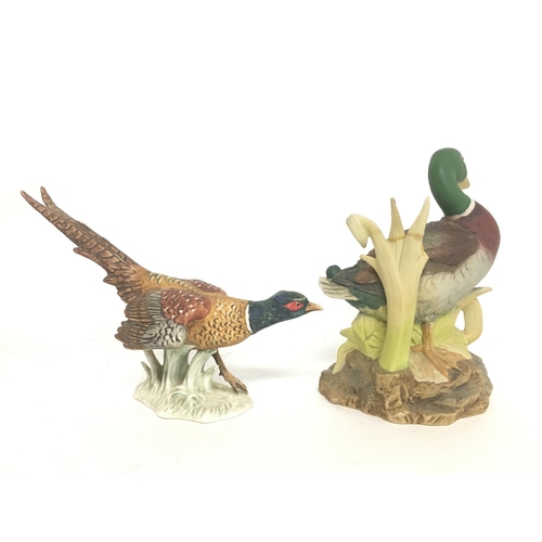 1228 - Porcelain figures including a Goebel pheasant and a Spode Malard duck figure. Approximately 14 & 17c... 