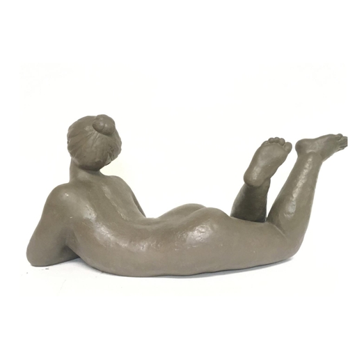 1250 - A large Nao figure of a nude lady , 50cm long 22cm tall approximately. No obvious damage or restorat... 