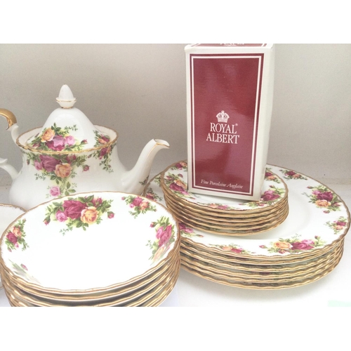 1268 - A Royal Albert Country Rose Tea And Dinner Set.