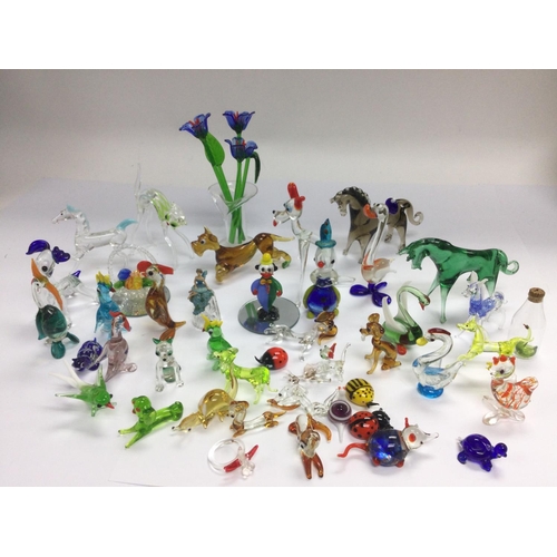 1296 - A collection of glass animals. Shipping category D.