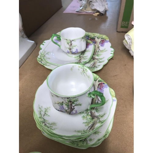 1320 - A Royal Albert greenwood tree tea set comprising cups saucers and side plates sugar bowl . One crack... 