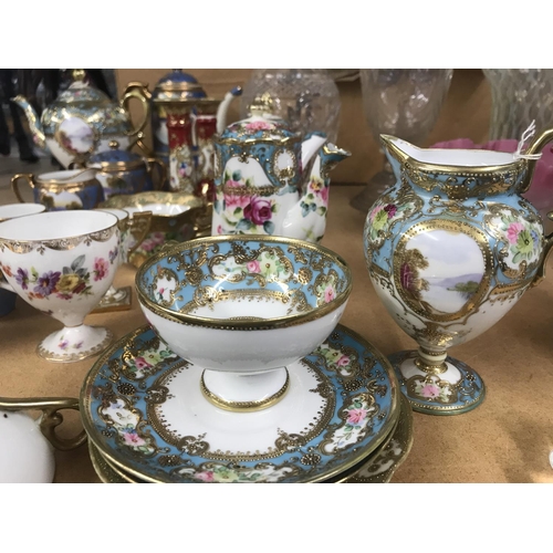 1325 - Two part Noritake tea sets and a pair of candle sticks.