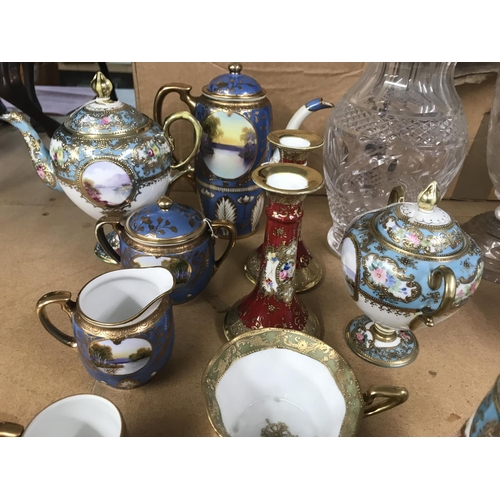 1325 - Two part Noritake tea sets and a pair of candle sticks.