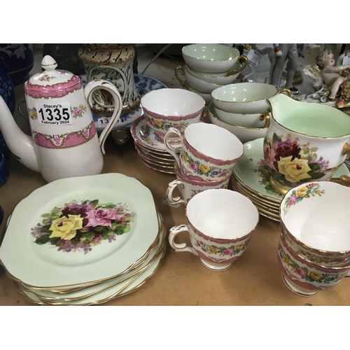 1335 - Two part tea sets Crown Staffordshire decorated with flowers and foliage,