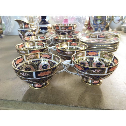 1352 - A royal crown derby tea set decorated in mirari patten, comprising of 6 tea cups, saucers, side plat... 