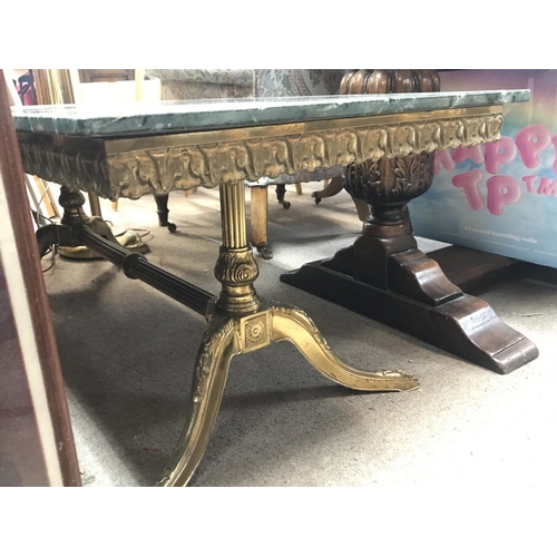 1455 - A gilt metal coffee table with a green marble top, dimensions 55x130x45cm.