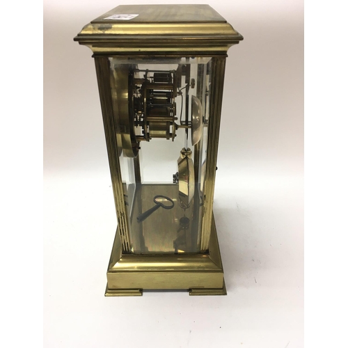 1480 - 4 glass mantle clock with visible pendant & roman numerals. 34cm x 22cm x 12cm