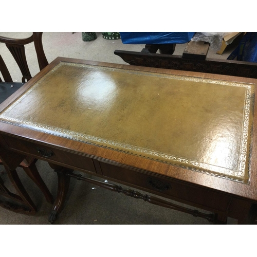 1532 - A Mahogany drop leaf writing desk with a leather top and two drawers. Dimensions 50x94x74cm