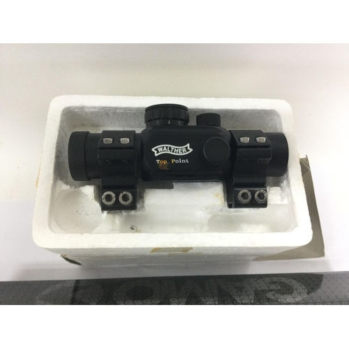 1656 - Two boxed air gun sights. Shipping category D.