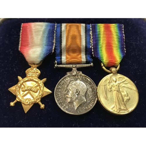 1663 - A miniature WW1 medal set, postage category A