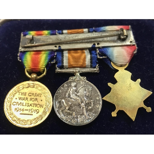 1663 - A miniature WW1 medal set, postage category A