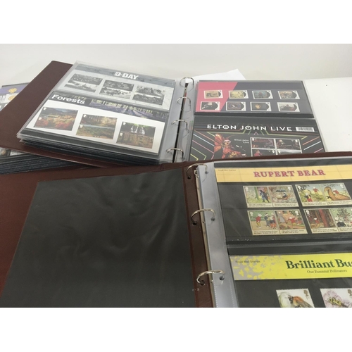 1664 - Two albums full with presentation packs including higher value stamps one other album with a few pre... 