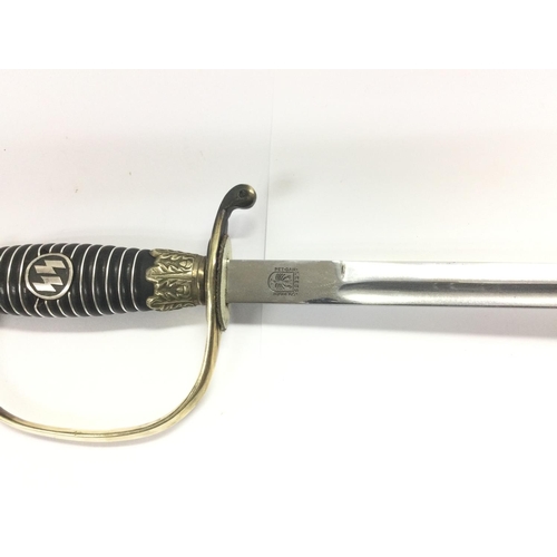 1676 - A WW2 SS officer's sword with silver plated fittings and SS approved stamps and markings complete wi... 