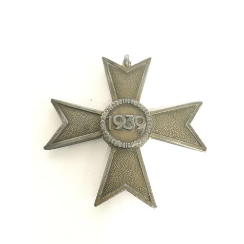 1706 - WW2 Nazi merit cross and a badge , postage category A