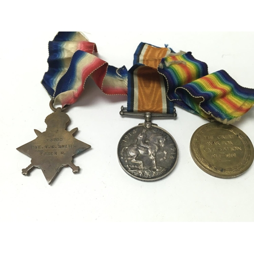 1710 - World War One medals awarded to PTE and CPL T A Smith. Also includes some medals and pendants. Posta... 