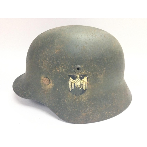 1727 - A WWII Third Reich Double Decal Helmet and Liner. Stamped ET237.